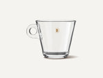 Ein leeres CoffeeB Lungo-Glas.